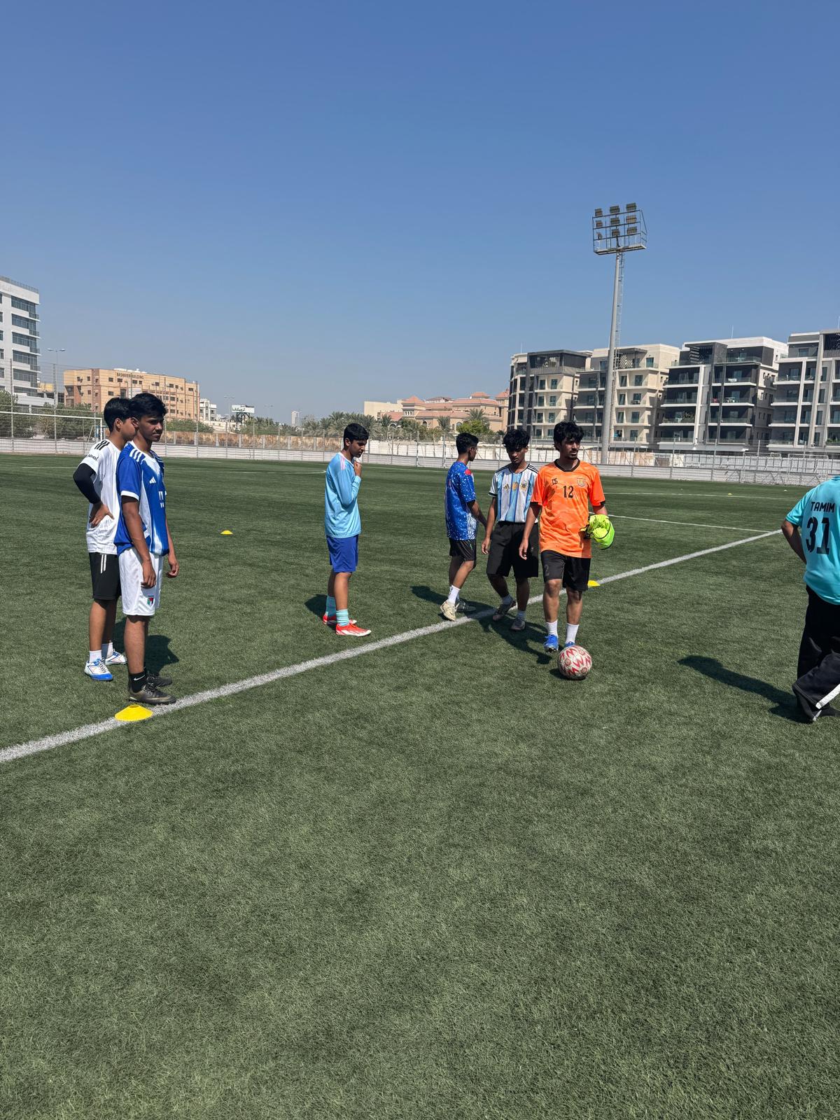 Students practicing football
