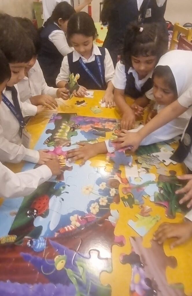 Students doing a group puzzle activity