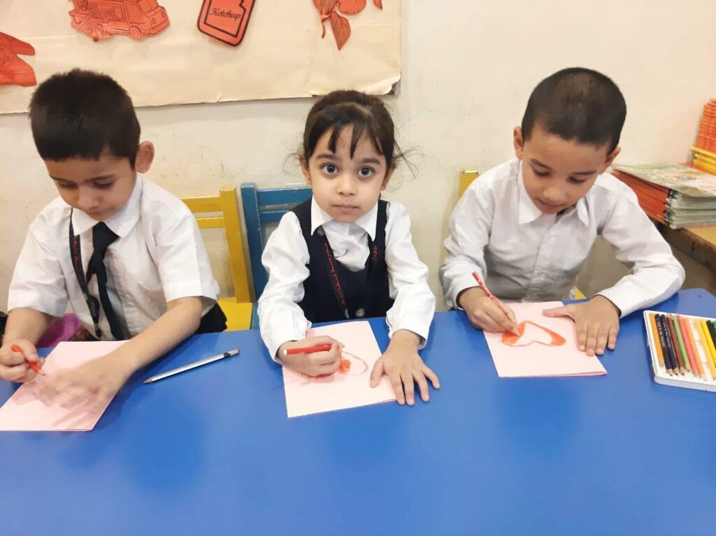 Students making Valentine's Day cards